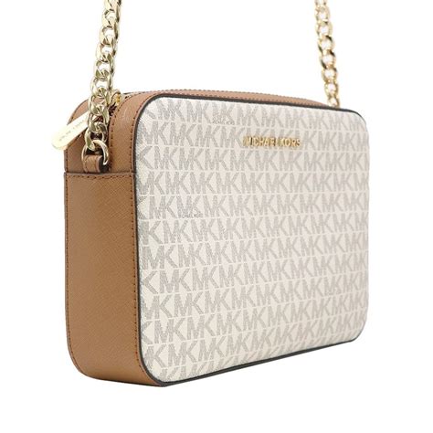 michael kors sling bag white|michael kors sling bag original.